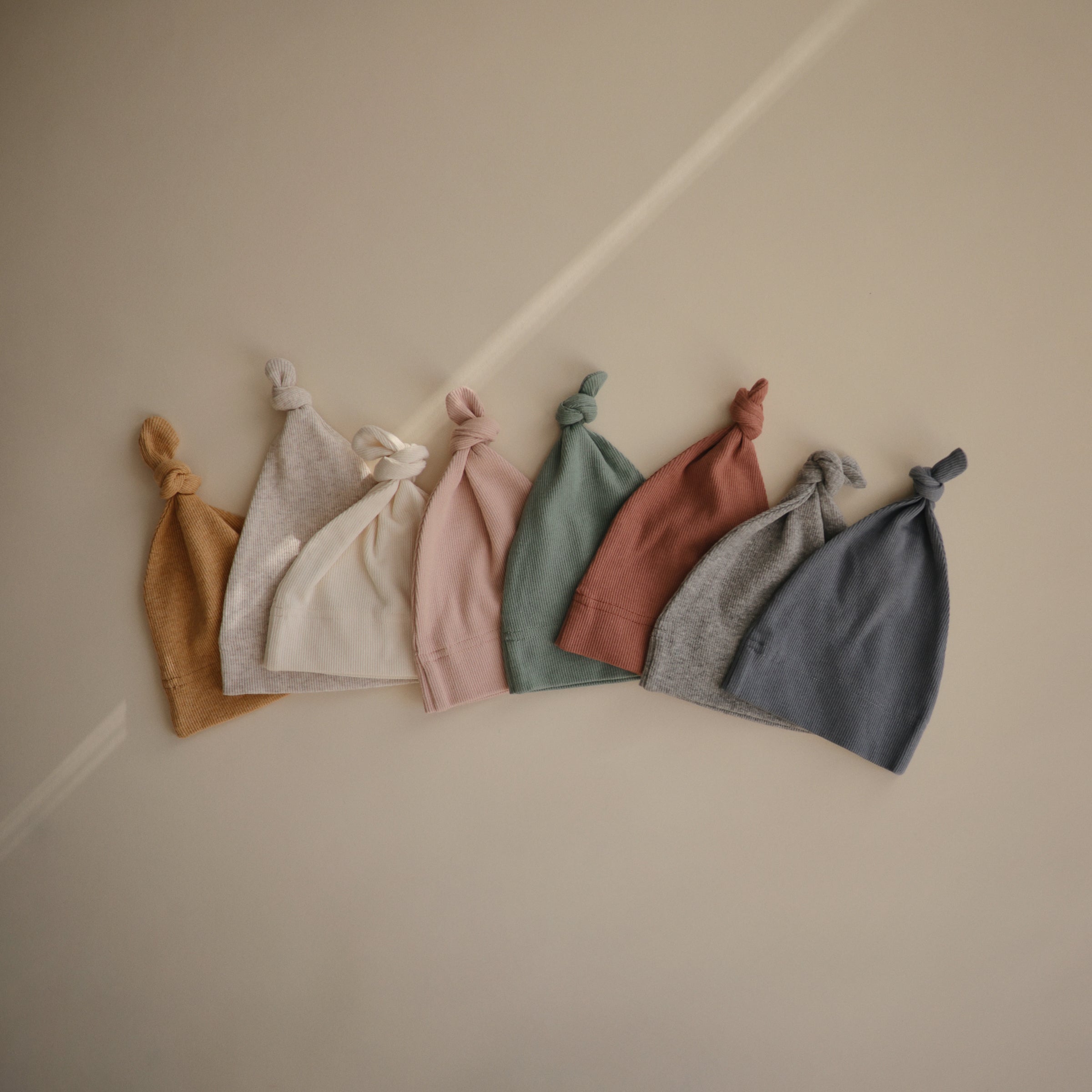 Image of Ribbed Knotted Baby Gown + Beanie Set